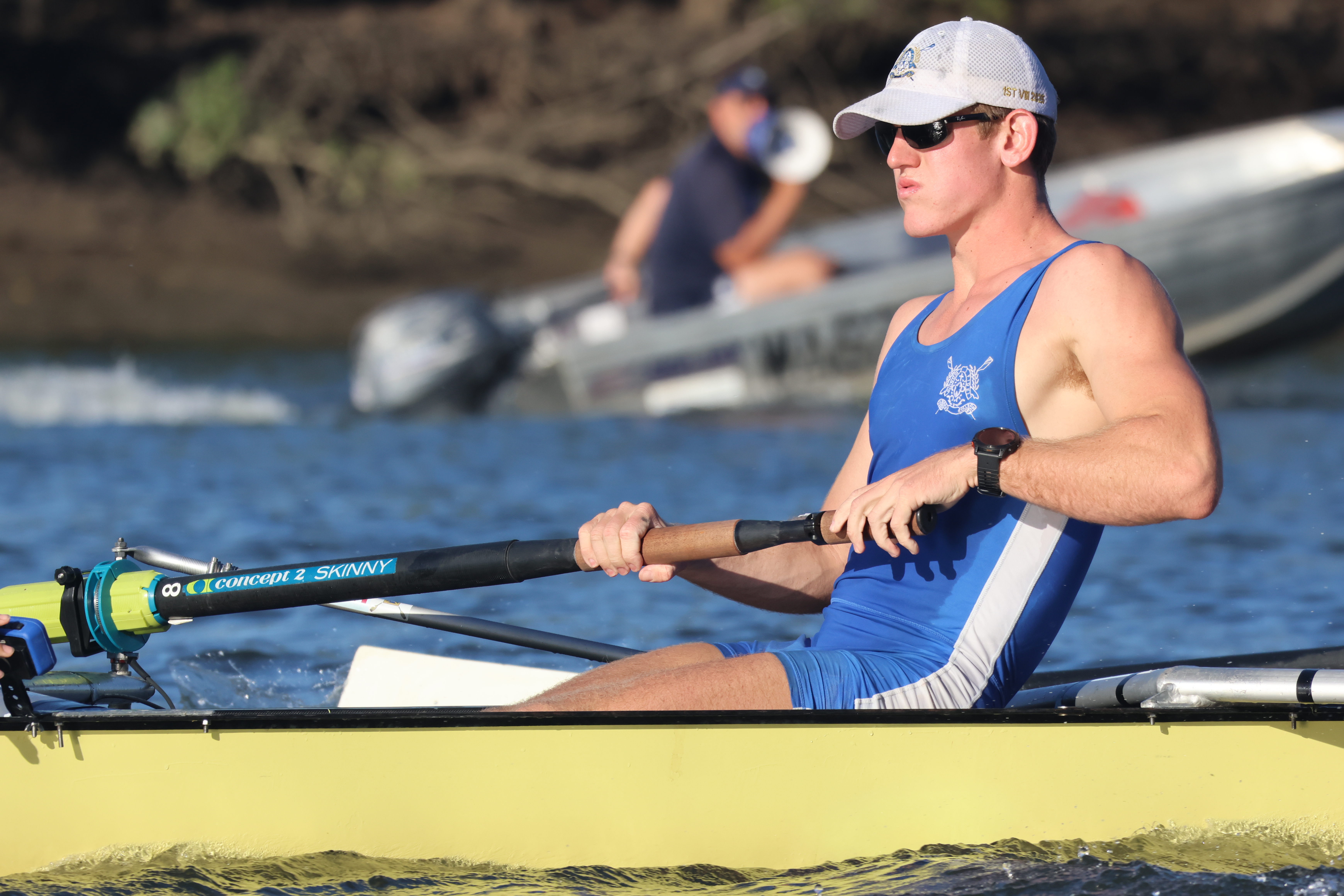 Dash Withnall rowing single scull at Nudgee College